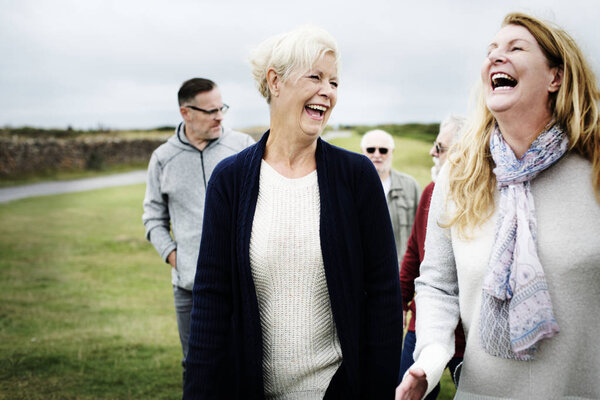 Group of elderly people enjoying together