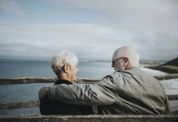 Senior Couple Enjoying View Ocean Stock Picture