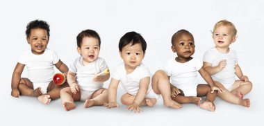 Diverse babies sitting on the floor clipart