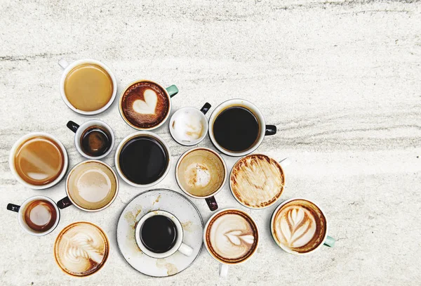 テクスチャ背景の盛り合わせコーヒー カップ — ストック写真