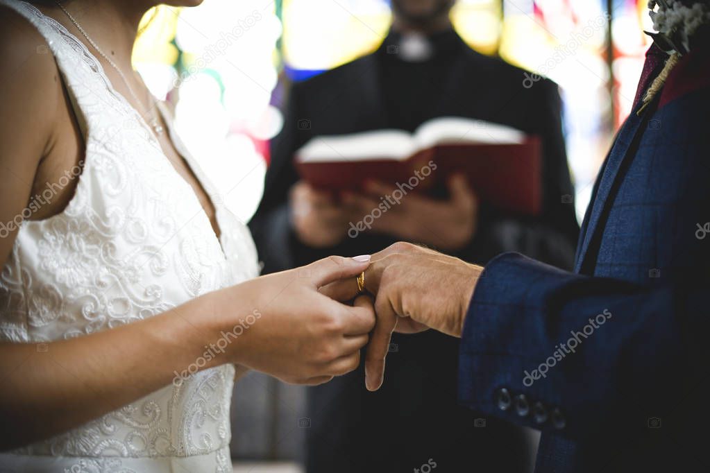 Bride and groom at the altar