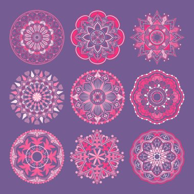Mor arkaplanda pembe mandala desenleri