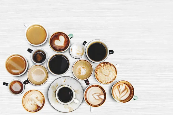 Diverse Koffie Kopjes Een Gestructureerde Achtergrond — Stockfoto