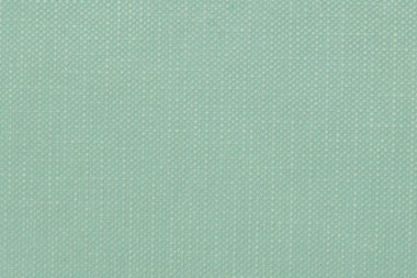 Yeşil engebeli dokulu kumaş halı