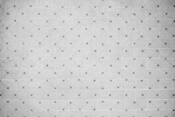 ドットで灰色のレンガの壁のテクスチャ背景 — ストック写真