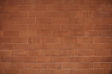 Dokulu arka plan kırmızımsı turuncu tuğla duvar