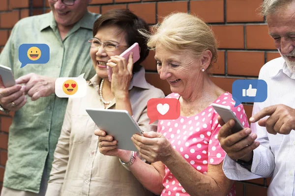 Diverse Elderly Using Digital Devices — Stock Photo, Image