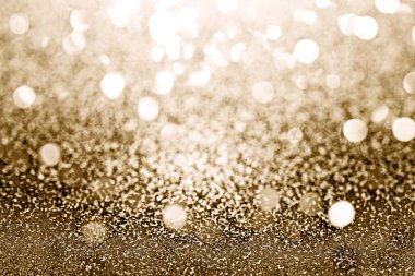 Shiny gold glitter textured background clipart