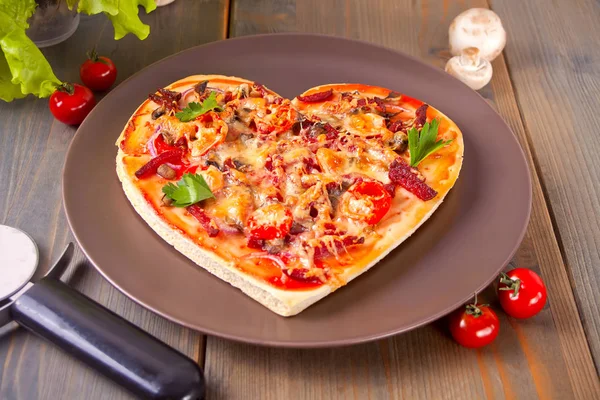 Pizza in the shape of heart for Valentine\'s Day