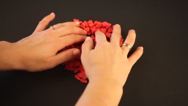 Woman Hands Make Heart Heart Shaped Red Candy Black Background — Stock Video