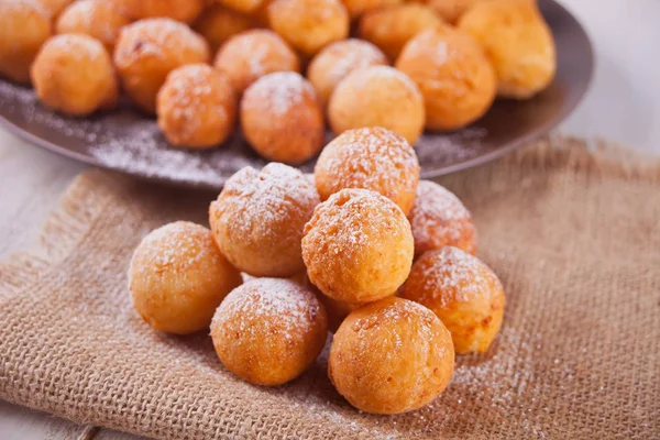 Small balls of freshly baked homemade cottage cheese doughnuts — Stock Photo, Image