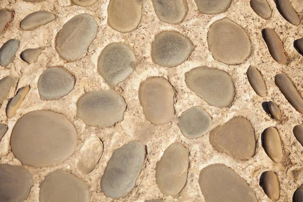 Настенная или напольная текстура из камня и бесшовный фон — стоковое фото