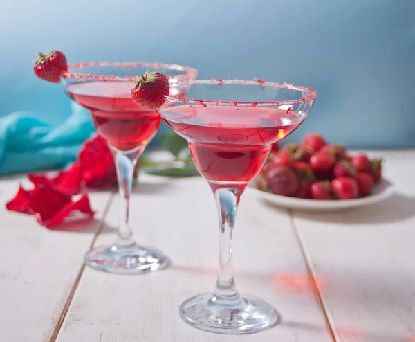 Red exotic alcoholic cocktail in clear glasses — Stock Photo, Image