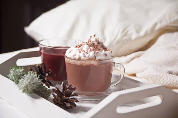 Cup of cocoa on the white tray on the bed early winter morning — Stock Photo, Image