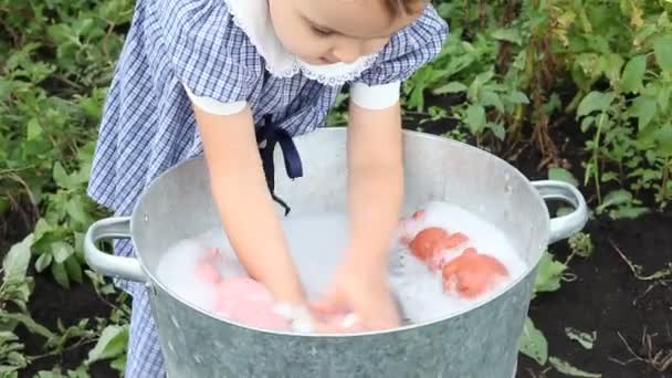 Girl Washing Dolls Tin Basin Outdoors Sunny Day Retro Style — Stock Video