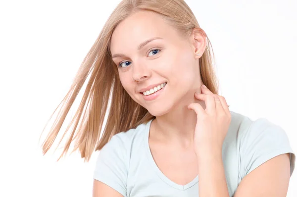 Blonde female looking at camera and smiling — Stock Photo, Image