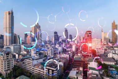 Soyut teknoloji hologramları Bangkok, Asya 'nın panorama şehri görüntüsü üzerinde simgeler. İnsanların ağ kurma ve bağlantı kurma kavramı. Çift pozlama.