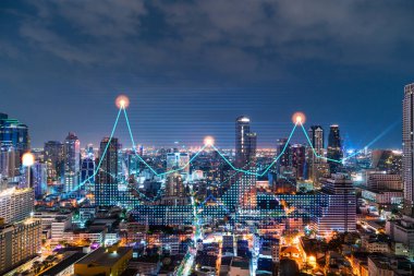 Borsa grafiği hologramı, Bangkok 'un gece manzarası, Asya' da mali eğitim almak için popüler bir yer. Uluslararası araştırma kavramı. Çift pozlama.
