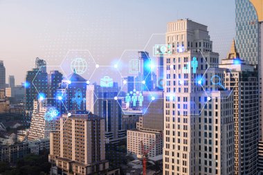 Araştırma ve Geliştirme Hologramı simgeleri parlıyor. Bangkok 'un günbatımı panoramik şehir manzarası. Asya 'da yeni hizmetler ve ürünler yaratmak için yenilikçi teknolojiler kavramı. Çift pozlama.