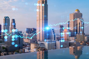 Işık saçan FOREX grafik hologramı, gün batımında Bangkok 'un panoramik şehir manzarası. Asya 'da hisse ve tahvil ticareti. Fon yönetimi kavramı. Çift pozlama.