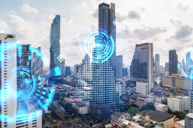 Soyut teknoloji hologramları Bangkok, Asya 'nın panorama şehri görüntüsü üzerinde simgeler. İnsanların ağ kurma ve bağlantı kurma kavramı. Çift pozlama.