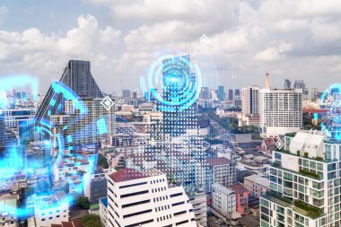 Soyut teknoloji hologramları Bangkok, Asya 'nın panorama şehri görüntüsü üzerinde simgeler. İnsanların ağ kurma ve bağlantı kurma kavramı. Çift pozlama.