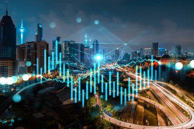 FOREX grafik hologramı, Kuala Lumpur 'un hava gece panoramik şehir manzarası. KL, Asya, Malezya 'da borsa araştırmacıları için geliştirilmiş bir yerdir. Temel analiz kavramı.