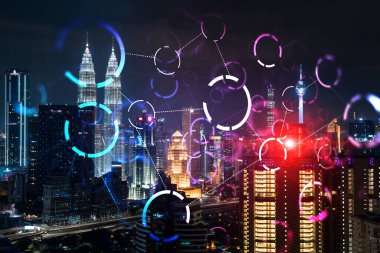 Soyut teknoloji simgeleri, Kuala Lumpur, Malezya, Asya 'nın gece panoramik şehir manzarası. Uluslararası iş sürecini optimize etmek için yenilikçi yaklaşım kavramı. Çift pozlama.