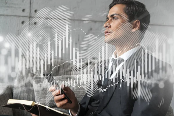 Man in office think and dream datum financial service forex graph and chart technology drawing concept. Double exposure.