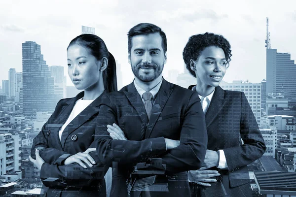 Front view of three successful smiling business consultants standing in a row in suits and crossed arms pose. Bangkok cityscape. Multinational corporate team. Double exposure.