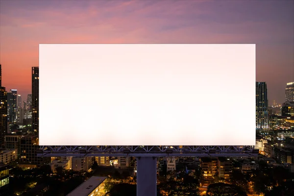 Blank white road billboard with Bangkok cityscape background at night time. Street advertising poster, mock up, 3D rendering. Front view. The concept of marketing communication to promote idea. — Stock Photo, Image