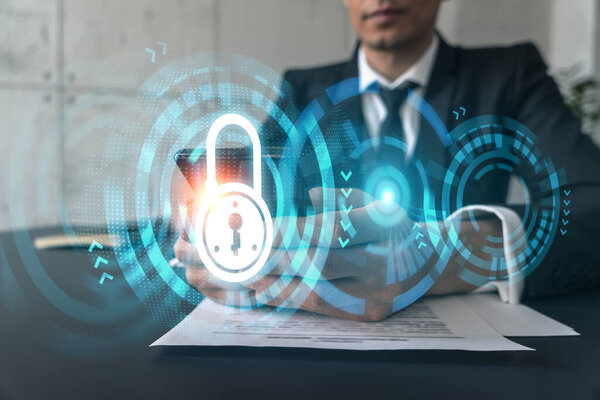 Man in office working with Smartphone, Searching for new technology to protect business information. Lock hologram, typing phone. Double exposure.