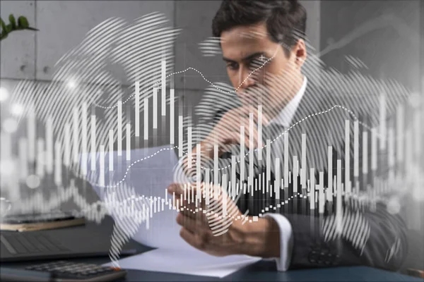 Man in office think and dream datum financial service forex graph and chart technology drawing concept. Double exposure.