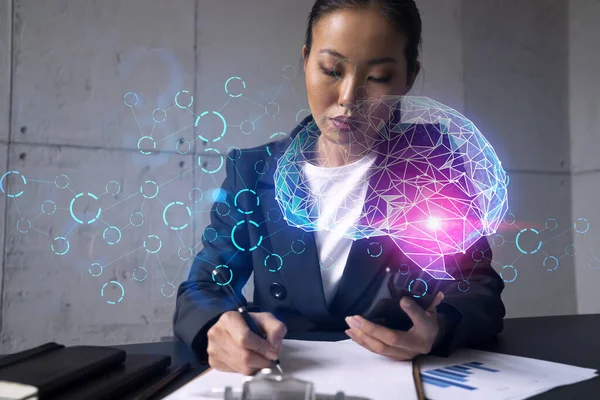 Businesswoman taking notes and brain drawing hologram. Double exposure. Business technology solution.