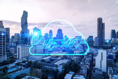 Parlak bulut ikonu hologramı, gün batımında Bangkok 'un panoramik şehir manzarası. Asya 'da dijital veri depolama kavramı. Çoklu pozlama.
