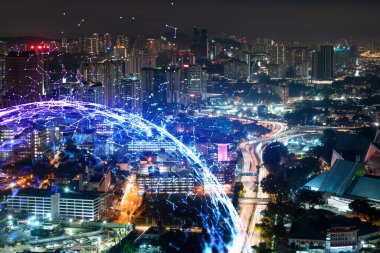 Soyut teknoloji simgeleri, Kuala Lumpur, Malezya, Asya 'nın gece panoramik şehir manzarası. Uluslararası iş sürecini optimize etmek için yenilikçi yaklaşım kavramı. Çift pozlama.