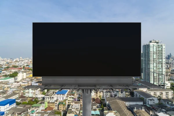 Blank black road billboard with Bangkok cityscape background at day time. Street advertising poster, mock up, 3D rendering. Front view. The concept of marketing communication to promote or sell idea. — Stock Photo, Image