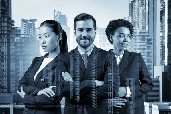 Front view of three successful smiling business consultants standing in a row in suits and crossed arms pose. Bangkok cityscape. Multinational corporate team. Double exposure.