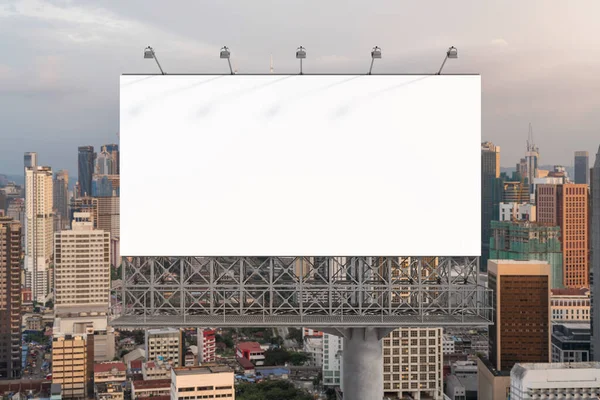 Blank white road billboard with Kuala Lumpur cityscape background at sunset. Street advertising poster, mock up, 3D rendering. Front view. — Stock Photo, Image