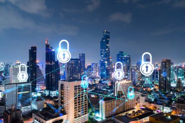 Parlayan Padlock hologramı, Bangkok, Asya 'nın gece panoramik şehir manzarası. Şirketleri korumak için siber güvenlik kavramı. Çift pozlama.