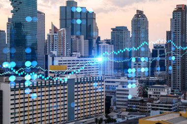 Işık saçan FOREX grafik hologramı, gün batımında Bangkok 'un panoramik şehir manzarası. Asya 'da hisse ve tahvil ticareti. Fon yönetimi kavramı. Çift pozlama.
