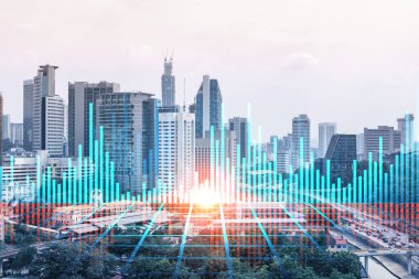 Kuala Lumpur 'un Panorama şehri manzarası üzerinde eski ve borsa hologramı. KL, Malezya, Asya 'daki finans merkezidir. Uluslararası ticaret kavramı. Çift pozlama.