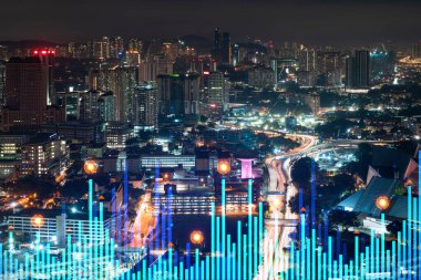 Borsa grafiği hologramı, Kuala Lumpur 'un gece manzarası. KL, Malezya, Asya 'da mali eğitim almak için popüler bir yerdir. Uluslararası araştırma kavramı. Çift pozlama.