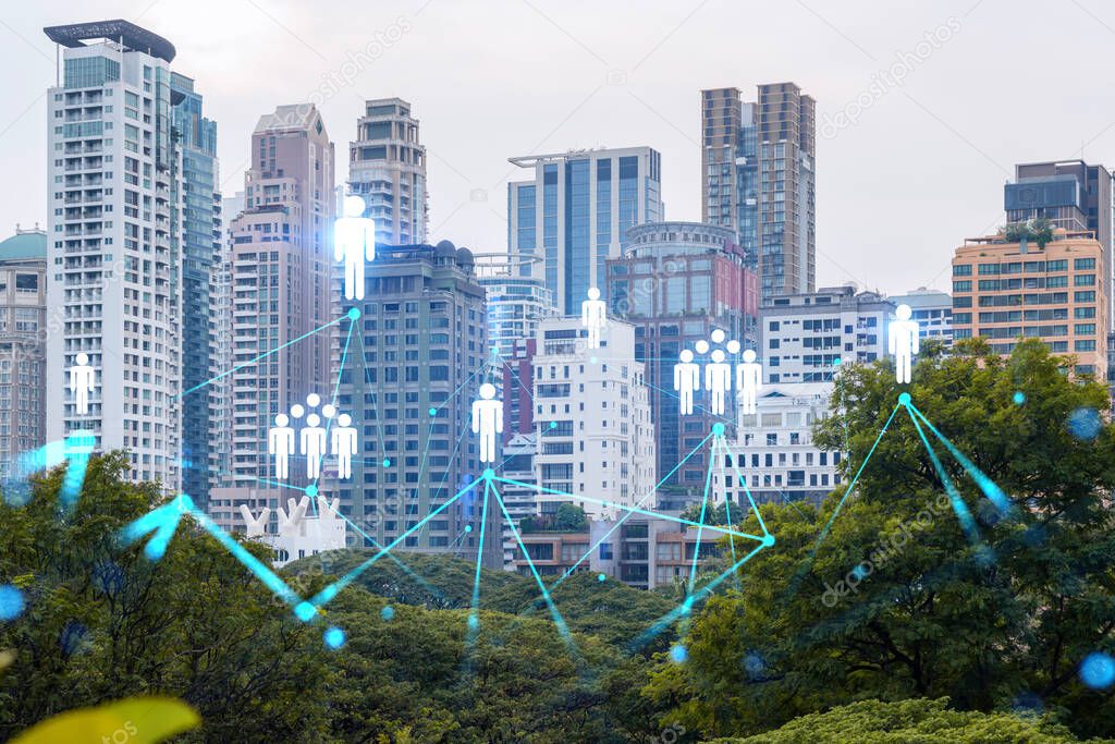 Social media icons hologram over panorama city view of Bangkok, Asia. The concept of people networking and connections. Double exposure.