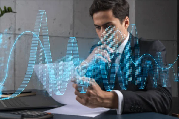 Man in office think and dream datum financial service graph and chart technology drawing concept. Double exposure.