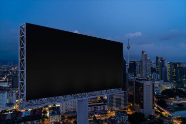 Blank black road billboard with KL cityscape background at night time. Street advertising poster, mock up, 3D rendering. Side view. The concept of marketing communication to promote or sell idea. clipart