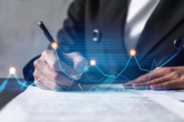 Woman signs agreement. Financial market chart and graph hologram. Double exposure . Business Analysis concept. clipart