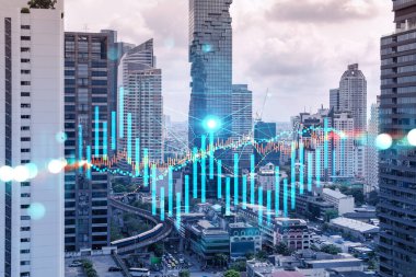 Asya 'daki finans merkezi Bangkok' un Panorama şehri manzarası üzerinde eski ve borsa hologramı. Uluslararası ticaret kavramı. Çift pozlama.