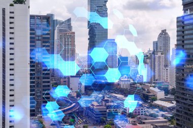 Soyut teknoloji hologramları Bangkok, Asya 'nın panorama şehri görüntüsü üzerinde simgeler. İnsanların ağ kurma ve bağlantı kurma kavramı. Çift pozlama.