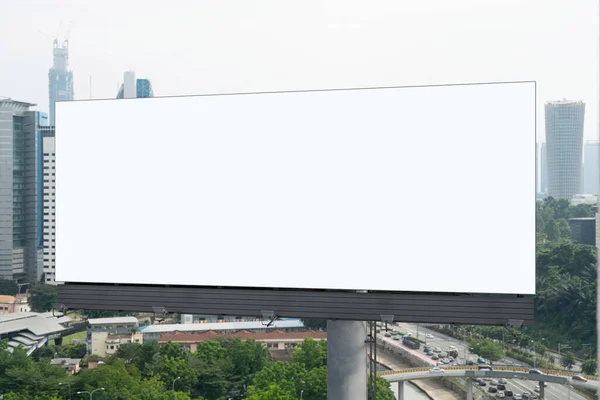 Blank white road billboard with KL cityscape background at day time. Street advertising poster, mock up, 3D rendering. Front view. The concept of marketing communication to promote or sell idea. — Stock Photo, Image